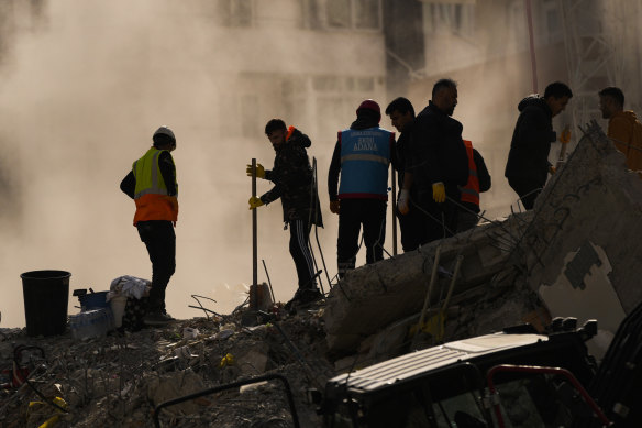 Emergency teams worked through night and day in search of survivors in Adana, Turkey