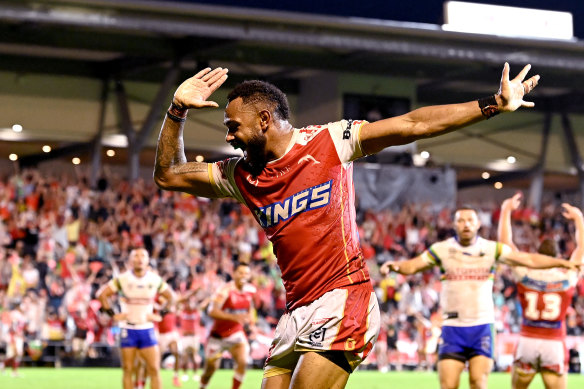 Hamiso Tabuai-Fidow does the ‘fin’ celebration after scoring the winning the try.