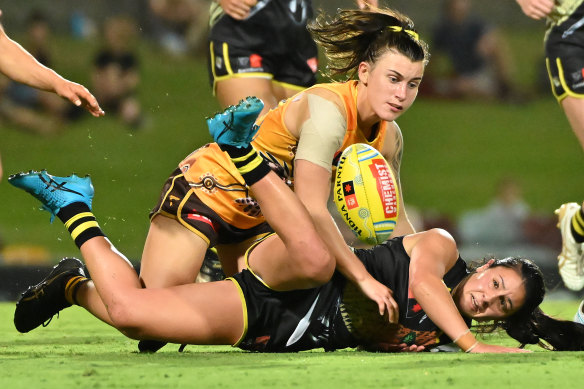 Tight tussle: Richmond’s Emelia Yassir is tackled.