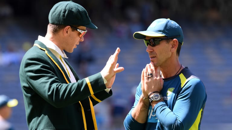 Brains trust: Tim Paine and coach Justin Langer.