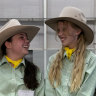 Macarthur Anglican School students and best friends Emily Chad and Annabelle Woodmor, both 12, with their favourite sheep.