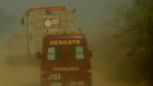 Firefighters advance through smoke near the National Forest of Jacunda in Rondonia state, part of Brazil's Amazon.