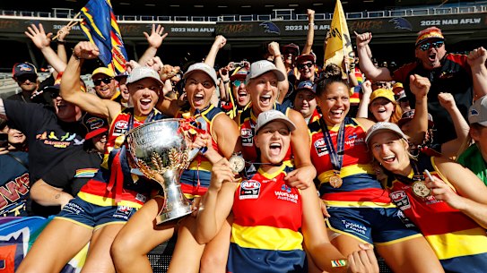 Erin Phillips, Ebony Marinoff, Danielle Ponter, Marijana Rajcic, Stevie-Lee Thompson and Nikki Gore of the Crows celebrate with fans.