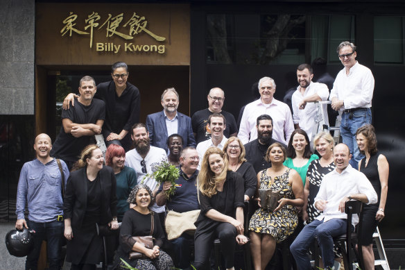 Kwong (back row, second from left) with suppliers, staff and collaborators involved in Billy Kwong in Potts Point. 