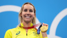  Emma McKeon celebrates Olympic gold.