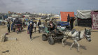 Palestinians fleeing from the southern Gaza city of Rafah during an Israeli ground and air offensive in the city on Tuesday, May 28, 2024.