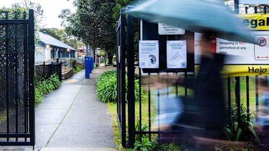 Parents dropping kids off at Lane Cove West Public School, where Sydney childcare worker David James allegedly filmed abuse of children.