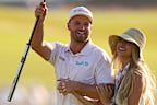 Wyndham Clark celebrates with his girlfriend Emily Tanner after winning the US Open at Shinnecock Hills Golf Club in Southampton, New York.