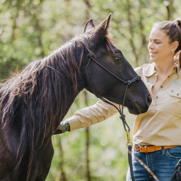 Sydneysider Cassandra Steppacher with her newly adopted brumby.