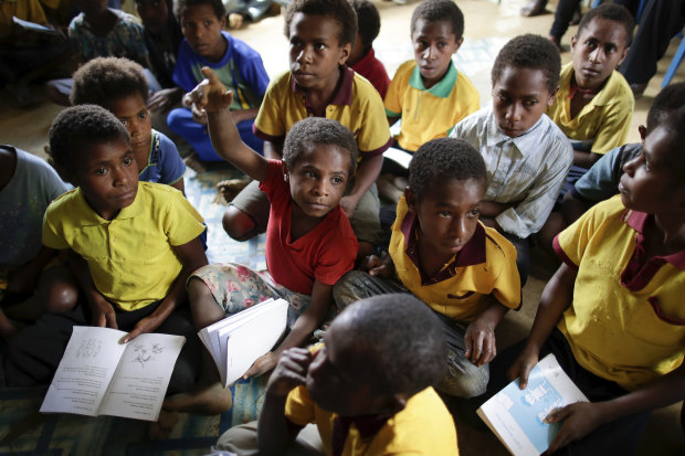 Children at the Famo Elementary School in the Eastern Highlands town of Kainantu.