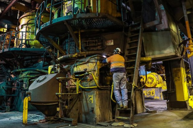 A worker in NSW’s Liddell coal-fired power station, which shut in April.