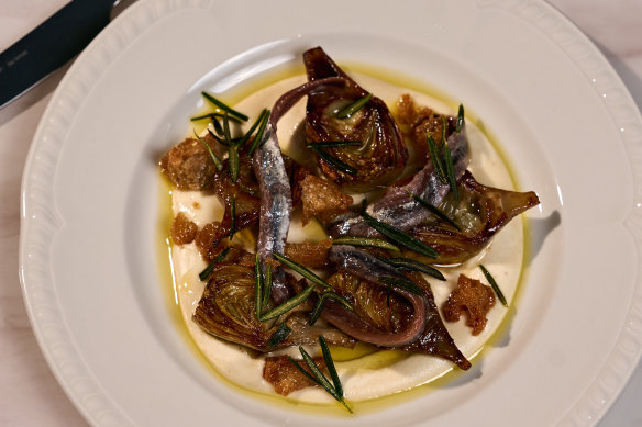 New-season globe artichokes are topped with Don Bocarte anchovies and chunky croutons.