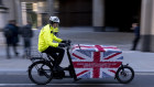 Pushing cargo in the City of London.