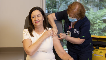 Queensland Premier Annastacia Palaszczuk is given the COVID-19 vaccination by clinical nurse Dawn Pedder at the Surgical Treatment Rehabilitation Service Centre in Brisbane.
