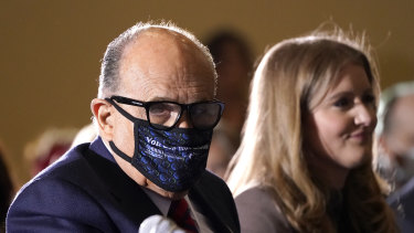 Former Mayor of New York Rudy Giuliani, a lawyer for President Donald Trump, wears a face mask in Pennsylvania on Wednesday.