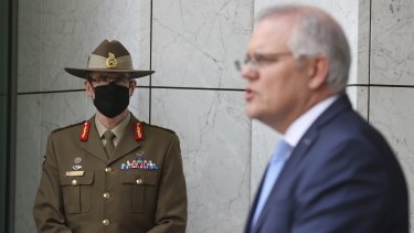 Chief of the Defence Force General Angus Campbell and Prime Minister Scott Morrison announcing Australia acquire nuclear-powered submarines.