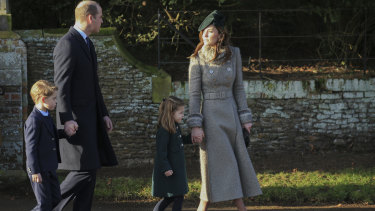 Prince George, 6, and Princess Charlotte, 4, walk hand-in-hand with their parents Prince William, Duke of Cambridge and Catherine, Duchess of Cambridge,
