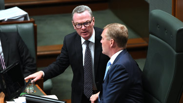 Leader of the House Christopher Pyne confers with Speaker Tony Smith on Tuesday.