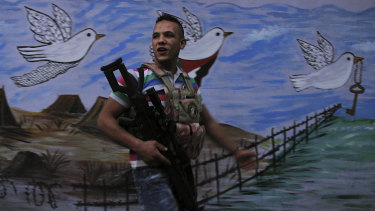 Fatah soldier Abu Raban patrols the streets of the Fatah area of Ain al-Hilweh, the Palestinian camp in Sidon, Lebanon.