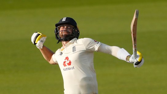 Chris Woakes celebrates England victory.