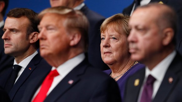 From left, French President Emmanuel Macron, then US president Donald Trump, German Chancellor Angela Merkel and Turkish President Recep Tayyip Erdogan at the 2019 NATO summit.