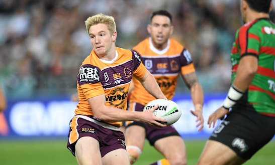 Baptism of fire: Teenage Brisbane halfback Tom Dearden looks to set up a support player on Thursday night.