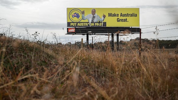 A Clive Palmer billboard on the Federal Highway in the lead up to the federal election.