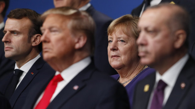 From left, French President Emmanuel Macron, then US president Donald Trump, German Chancellor Angela Merkel and Turkish President Recep Tayyip Erdogan at the 2019 NATO summit.