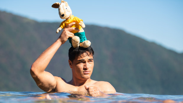 Young blood: Jordan Petaia with 'Wally', the team's mascot. 