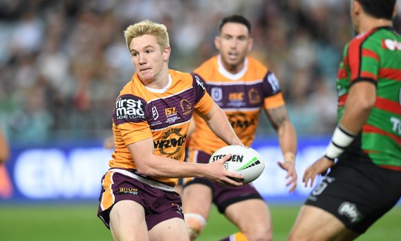 Baptism of fire: Teenage Brisbane halfback Tom Dearden looks to set up a support player on Thursday night.