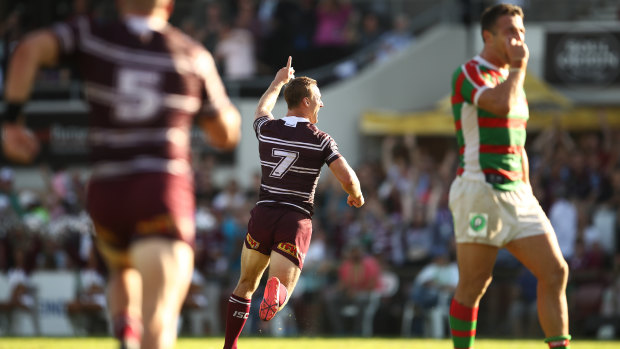 Golden boy: Daly Cherry-Evans celebrates after kicking the winning field goal against Souths in round four. 