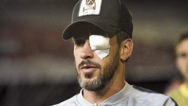 Boca's Pablo Perez sustained an eye injury in the attack.