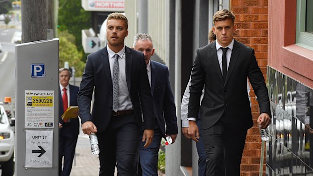 Callan Sinclair (right) arrives at the NSW District Court in Wollongong on Wednesday.