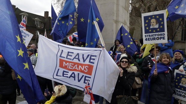 Protesters gathered in London on Tuesday as the UK Parliament was set to vote on competing Brexit plans.