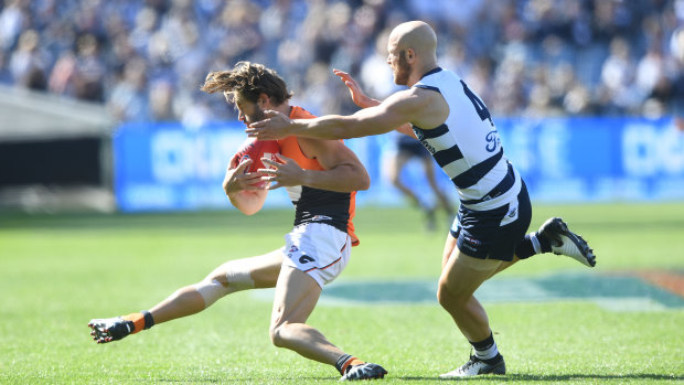 Callan Ward injures his knee against Geelong in round four last year.