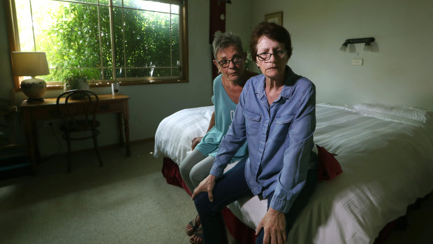 Lynda Henderson, left, who cares for Veda Meneghetti, who has early onset dementia, at home.