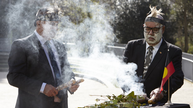 Douglas Milera (left) and Professor Peter Buckskin during a repatriation ceremony in London on Tuesday.