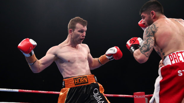 Shaping up: Jeff Horn opens his guard during an exchange against Victorian fighter Michael Zerafa.
