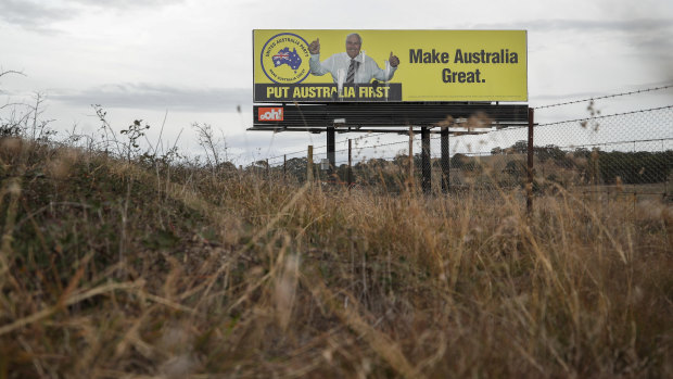 A Clive Palmer billboard on the Federal Highway in the lead up to the federal election.