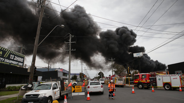 Black smoke poured out of the burning factory throughout Thursday.