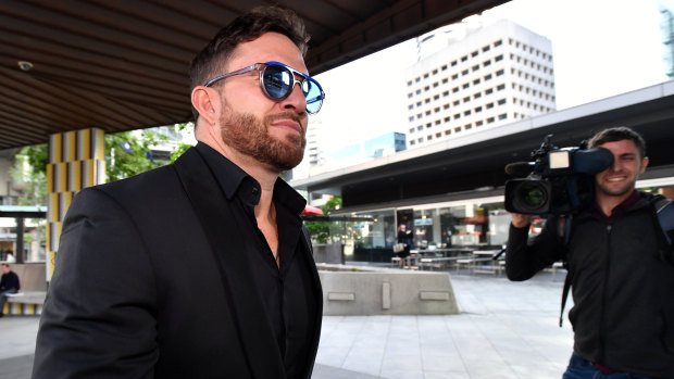 Married at First Sight star Daniel Webb is seen arriving at the Brisbane Magistrates Court.