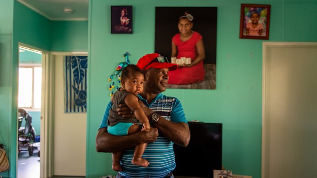 Pabai with his grandson Chad at their home on Boigu Island.