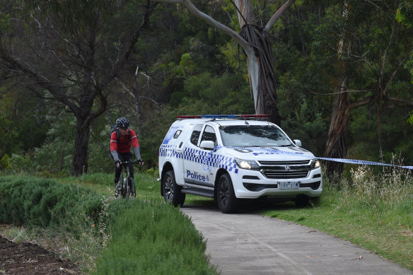 Police at the scene of an attack on a jogger on the Merri Creek trail in Coburg.