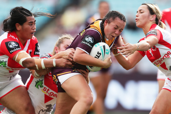 Dally M Medal winner Raecene McGregor (centre) has signed with the Dragons in 2023.