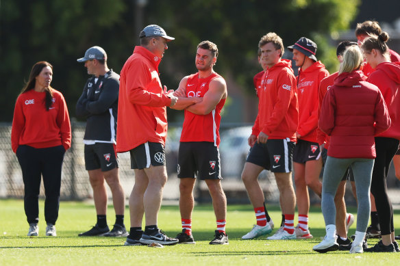 Tom Papley talks to John Longmire at training.