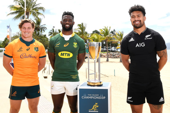 Michael Hooper, Siya Kolisi and Ardie Savea pose for a photo in Townsville on Friday. 
