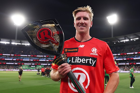 Will Sutherland with the Melbourne Mace after hitting the winning runs for the Renegades.