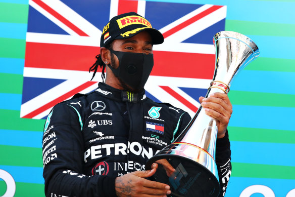 Mercedes driver Lewis Hamilton celebrates his Spanish Grand Prix win on Sunday.