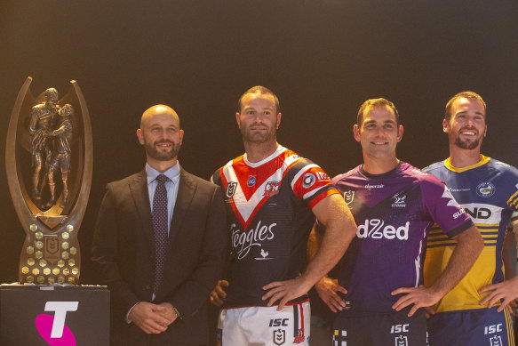 NRL chief Todd Greenberg at a captains' team photo with Boyd Cordner, Cameron Smith and Clint Gutherson at the NRL saeason launch in Sydney.