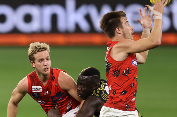 Darcy Parish (left) and Zach Merrett (right) have formed a formidable combination for the Bombers.
